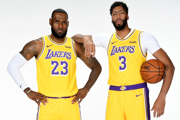 EL SEGUNDO, CA - SEPTEMBER 27: LeBron James #23 and Anthony Davis #3 of the Los Angeles Lakers pose for a portrait during media day on September 27, 2019 at the UCLA Health Training Center in El Segundo, California. NOTE TO USER: User expressly acknowledges and agrees that, by downloading and/or using this photograph, user is consenting to the terms and conditions of the Getty Images License Agreement. Mandatory Copyright Notice: Copyright 2019 NBAE (Photo by Andrew D. Bernstein/NBAE via Getty Images)