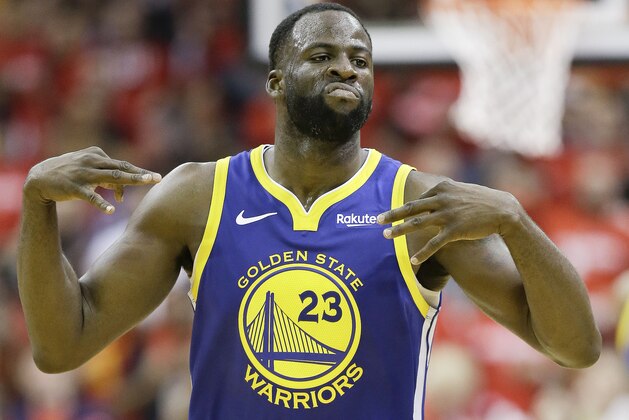 Golden State Warriors forward Draymond Green reacts after making a three-point basket during the second half of Game 3 of a second-round NBA basketball playoff series against the Houston Rockets, Saturday, May 4, 2019, in Houston. (AP Photo/Eric Christian Smith)