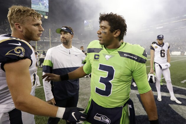 Seattle Seahawks quarterback Russell Wilson (3) greets Los Angeles Rams' Cooper Kupp after an NFL football game Thursday, Oct. 3, 2019, in Seattle. The Seahawks won 30-29. (AP Photo/Elaine Thompson)