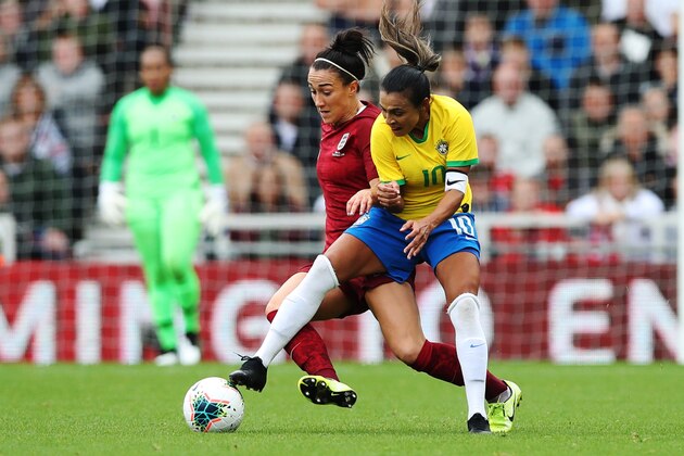 MIDDLESBROUGH, ENGLAND - OCTOBER 05: Lucy Bronze of England vies with Martha of Brazil during the International friendly match between England and Brazil at Riverside Stadium on October 05, 2019 in Middlesbrough, England. (Photo by Ian MacNicol/Getty Images)