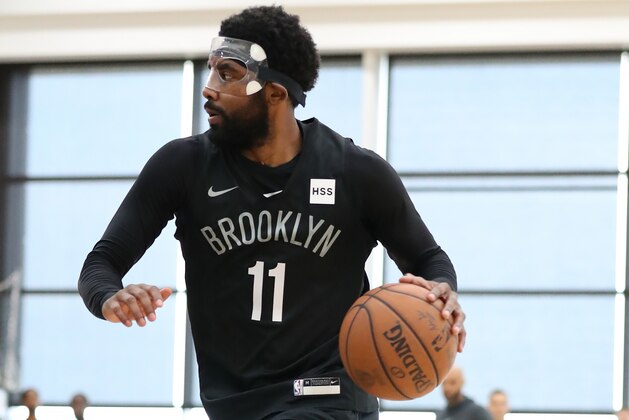 BROOKLYN, NY - OCTOBER 1: Kyrie Irving #11 of the Brooklyn Nets handles the ball during practice on October 1, 2019 at HSS Training Center in Brooklyn, New York. NOTE TO USER: User expressly acknowledges and agrees that, by downloading and or using this Photograph, user is consenting to the terms and conditions of the Getty Images License Agreement. Mandatory Copyright Notice: Copyright 2019 NBAE (Photo by Nathaniel S. Butler/NBAE via Getty Images)