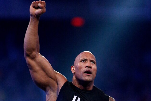 IMAGE DISTRIBUTED FOR WWE - Dwayne Johnson aka The Rock is seen during Wrestlemania XXX at the Mercedes-Benz Super Dome in New Orleans on Sunday, April 6, 2014. (Jonathan Bachman/AP Images for WWE)