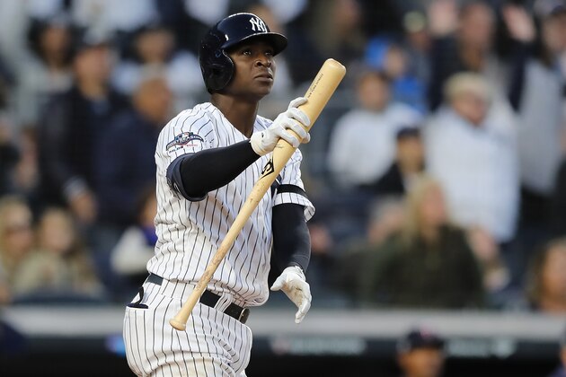NEW YORK, NEW YORK - OCTOBER 05: Didi Gregorius #18 of the New York Yankees watches his grand slam home run off Tyler Duffey #21 of the Minnesota Twins in the third inning in game two of the American League Division Series at Yankee Stadium on October 05, 2019 in New York City. (Photo by Elsa/Getty Images)