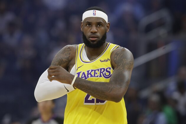 Los Angeles Lakers forward LeBron James (23) against the Golden State Warriors during the first half of a preseason NBA basketball game in San Francisco, Saturday, Oct. 5, 2019. (AP Photo/Jeff Chiu)