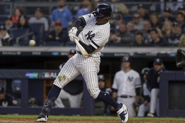 New York Yankees shortstop Didi Gregorius (18) connects for a grand slam home run against the Minnesota Twins during the third inning of Game 2 of an American League Division Series baseball game, Saturday, Oct. 5, 2019, in New York. (AP Photo/Frank Franklin II)
