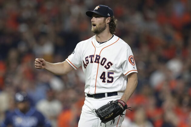 Houston Astros starting pitcher Gerrit Cole (45) reacts to a call during the sixth inning of Game 2 of a baseball American League Division Series against the Tampa Bay Rays in Houston, Saturday, Oct. 5, 2019. (AP Photo/Michael Wyke)