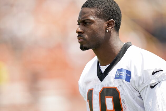 Cincinnati Bengal wide receiver A.J. Green (18) watches his teammates practice during the first day of NFL football training camp in Dayton, Ohio, Saturday, July 27, 2019, in Dayton, Ohio. (AP Photo/Bryan Woolston)