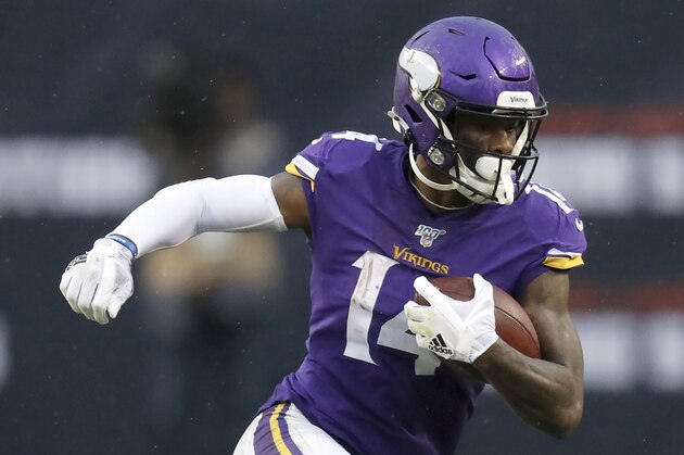 Minnesota Vikings' Stefon Diggs advances the ball during the second half of an NFL football game against the Chicago Bears Sunday, Sept. 29, 2019, in Chicago. (AP Photo/Charles Rex Arbogast)