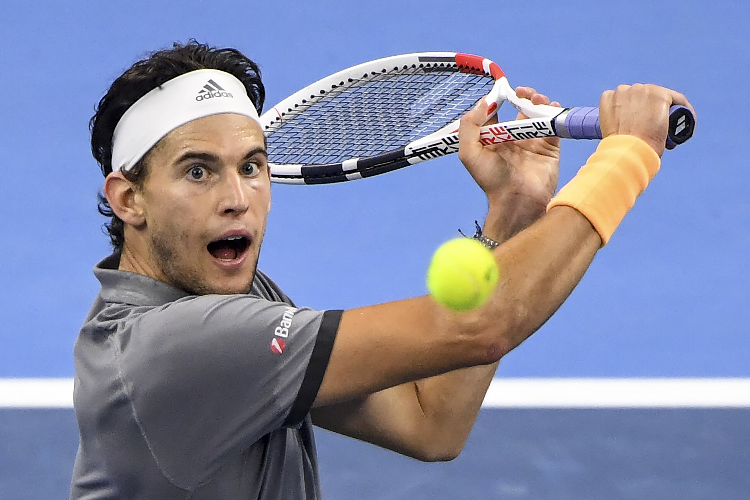 Dominic Thiem of Austria hits a return during his men's singles final match against Stefanos Tsitsipas of Greece at the China Open tennis tournament in Beijing on October 6, 2019. (Photo by GREG BAKER / AFP) (Photo by GREG BAKER/AFP via Getty Images)