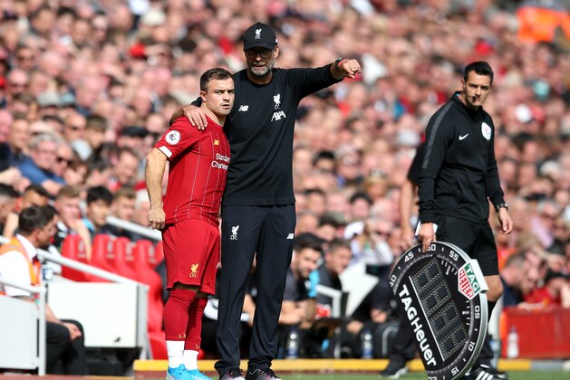 LIVERPOOL, ENGLAND - SEPTEMBER 14: Jurgen Klopp, Manager of Liverpool gives Xherdan Shaqiri of Liverpool instructions during the Premier League match between Liverpool FC and Newcastle United at Anfield on September 14, 2019 in Liverpool, United Kingdom. (Photo by Jan Kruger/Getty Images)