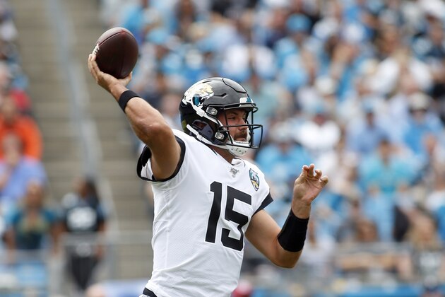 Jacksonville Jaguars quarterback Gardner Minshew (15) passes against the Carolina Panthers during the first half of an NFL football game in Charlotte, N.C., Sunday, Oct. 6, 2019. (AP Photo/Brian Blanco)
