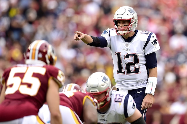 LANDOVER, MARYLAND - OCTOBER 06:  Tom Brady #12 of the New England Patriots calls out the play against the Washington Redskins during the second quarter in the game at FedExField on October 06, 2019 in Landover, Maryland. (Photo by Patrick McDermott/Getty Images)