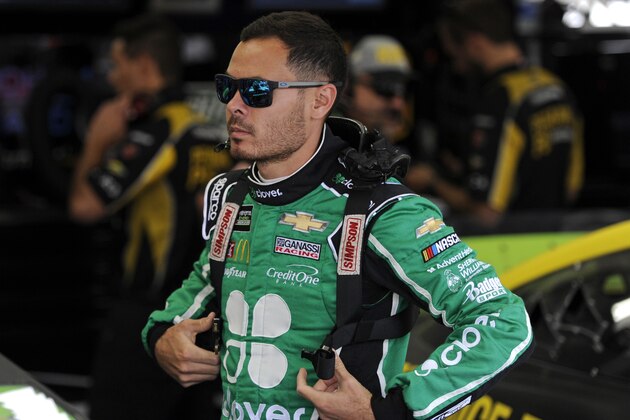 Kyle Larson waits in the garage during practice for Sunday's NASCAR Cup Series auto race at Charlotte Motor Speedway in Concord, N.C., Saturday, Sept. 28, 2019. (AP Photo/Mike McCarn)