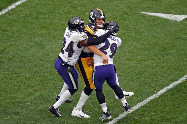 PITTSBURGH, PA - OCTOBER 06:  Mason Rudolph #2 of the Pittsburgh Steelers is injured on the play between Earl Thomas #29 and Brandon Carr #24 of the Baltimore Ravens on October 6, 2019 at Heinz Field in Pittsburgh, Pennsylvania.  (Photo by Justin K. Aller/Getty Images)