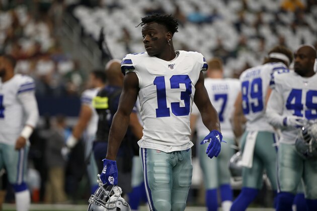 Dallas Cowboys wide receiver Michael Gallup (13) warms up before an NFL football game against the Green Bay Packers in Arlington, Texas, Sunday, Oct. 6, 2019. (AP Photo/Ron Jenkins)