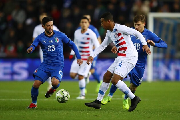 GENK, BELGIUM - NOVEMBER 20:  Tyler Adams of the United States battles for possession with Stefano Sensi of Italy and Nicolo Barella of Italy during the International Friendly match between Italy and the United States at Cristal Arena on November 20, 2018 in Genk, Belgium.  (Photo by Dean Mouhtaropoulos/Getty Images)