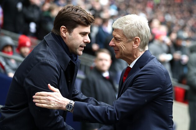 LONDON, ENGLAND - FEBRUARY 10: Mauricio Pochettino, Manager of Tottenham Hotspur and Arsene Wenger, Manager of Arsenal shake hands prior to the Premier League match between Tottenham Hotspur and Arsenal at Wembley Stadium on February 10, 2018 in London, England.  (Photo by Catherine Ivill/Getty Images)