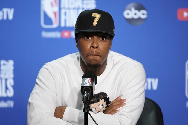 Toronto Raptors guard Kyle Lowry speaks at a news conference after Game 4 of basketball's NBA Finals against the Golden State Warriors in Oakland, Calif., Friday, June 7, 2019. (AP Photo/Tony Avelar)