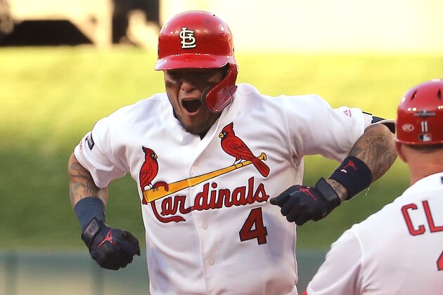 ST LOUIS, MISSOURI - OCTOBER 07:   Yadier Molina #4 of the St. Louis Cardinals celebrates after hitting an RBI game-tying single against the Atlanta Braves during the eighth inning in game four of the National League Division Series at Busch Stadium on October 07, 2019 in St Louis, Missouri. (Photo by Scott Kane/Getty Images)