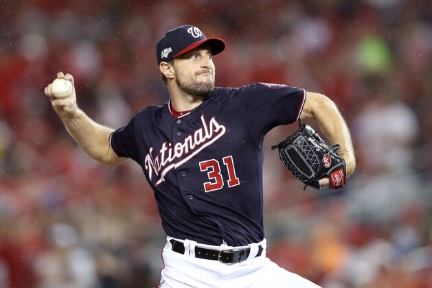 WASHINGTON, DC - OCTOBER 07: Max Scherzer #31 of the Washington Nationals delivers in the sixth inning of game four of the National League Division Series against the Los Angeles Dodgers at Nationals Park on October 07, 2019 in Washington, DC. (Photo by Rob Carr/Getty Images)