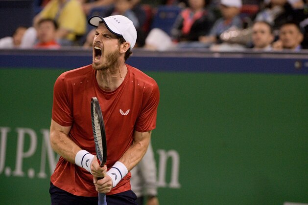 Andy Murray of Britain reacts during his match against Juan Ignacio Londero of Argentina during their first round men's singles match at the Shanghai Masters tennis tournament in Shanghai on October 7, 2019. (Photo by NOEL CELIS / AFP) (Photo by NOEL CELIS/AFP via Getty Images)