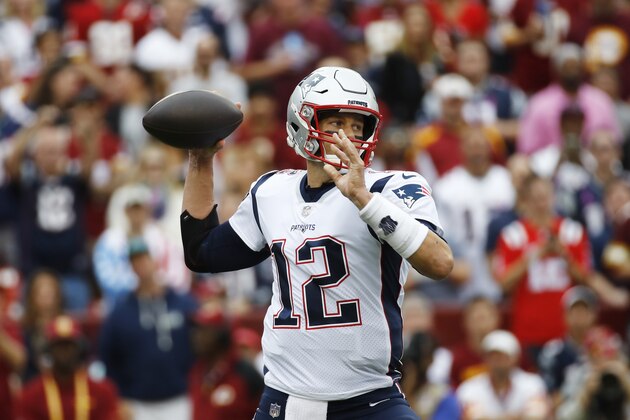 New England Patriots quarterback Tom Brady (12) works in ther pocket against the Washington Redskins during the first half of an NFL football game, Sunday, Oct. 6, 2019, in Landover, Md. (AP Photo/Patrick Semansky)