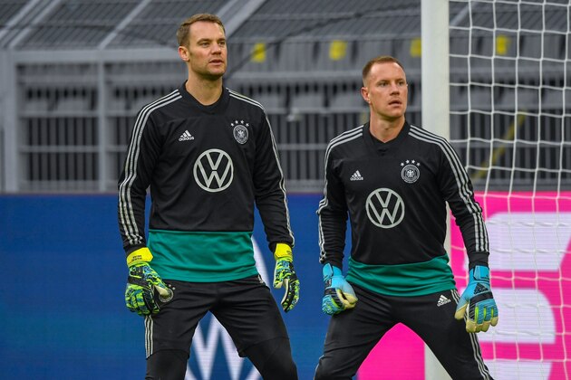 Germany's goalkeeper Manuel Neuer and Germany's goalkeeper Marc-Andre Ter Stegen (R) attend a training session of the German national football in Dortmund, western Germany on October 08, 2019. - Germany plays a friendly soccer match against Argentina in Dortmund on Wednesday. (Photo by Ina FASSBENDER / AFP) (Photo by INA FASSBENDER/AFP via Getty Images)