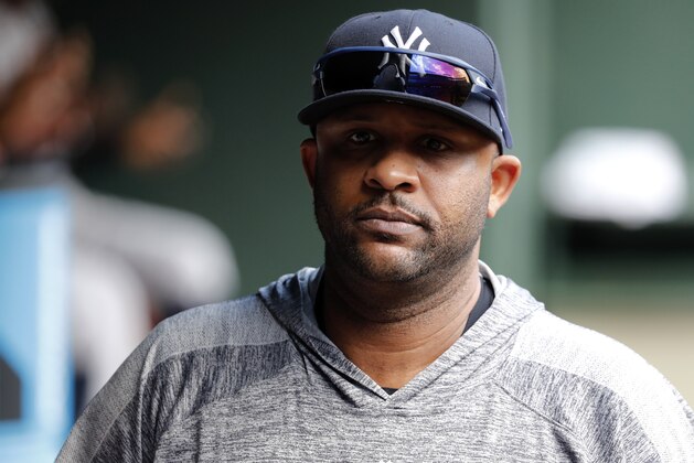 New York Yankees starting pitcher CC Sabathia walks through the dugout in the second inning of a baseball game against the Texas Rangers in Arlington, Texas, Sunday, Sept. 29, 2019. (AP Photo/Tony Gutierrez)