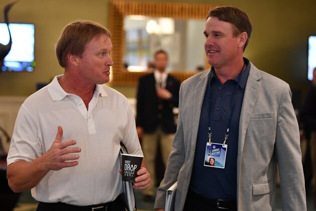 ORLANDO, FL - MARCH 26: Oakland Raiders head coach Jon Gruden and brother and Washington Redskins head coach Jay Gruden attend the 2018 NFL Annual Meetings at the Ritz Carlton Orlando, Great Lakes on March 26, 2018 in Orlando, Florida. (Photo by B51/Mark Brown/Getty Images)