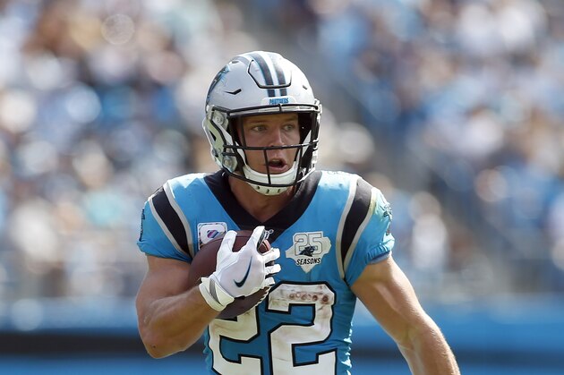 Carolina Panthers running back Christian McCaffrey (22) runs against the Jacksonville Jaguars during the first half of an NFL football game in Charlotte, N.C., Sunday, Oct. 6, 2019. (AP Photo/Brian Blanco)