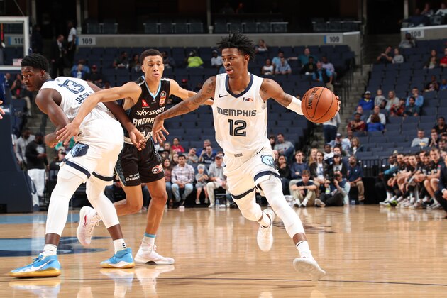 MEMPHIS, TN - OCTOBER 8: Ja Morant #12 of the Memphis Grizzlies drives to the basket against the New Zealand Breakers on October 8, 2019 at FedExForum in Memphis, Tennessee. NOTE TO USER: User expressly acknowledges and agrees that, by downloading and or using this photograph, User is consenting to the terms and conditions of the Getty Images License Agreement. Mandatory Copyright Notice: Copyright 2019 NBAE (Photo by Joe Murphy/NBAE via Getty Images)