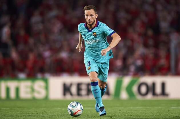 GRANADA, SPAIN - SEPTEMBER 21: Ivan Rakitic of FC Barcelona runs with the ball during the Liga match between Granada CF and FC Barcelona at Estadio Nuevo Los Cármenes on September 21, 2019 in Granada, Spain. (Photo by Quality Sport Images/Getty Images)