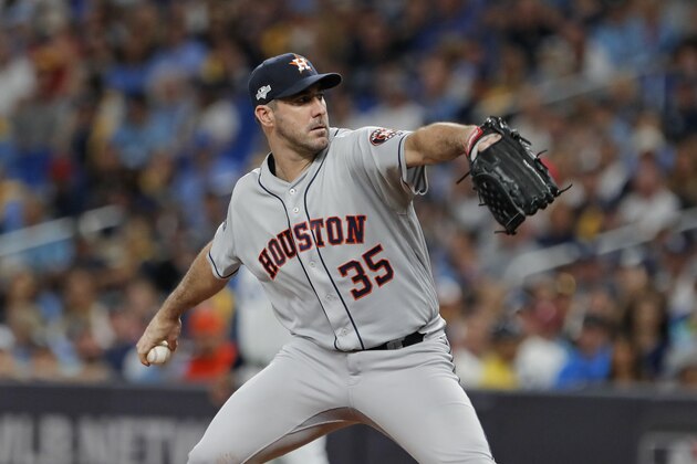 Houston Astros' Justin Verlander pitches against the Tampa Bay Rays in the first inning of Game 4 of a baseball American League Division Series, Tuesday, Oct. 8, 2019, in St. Petersburg, Fla. (AP Photo/Scott Audette)