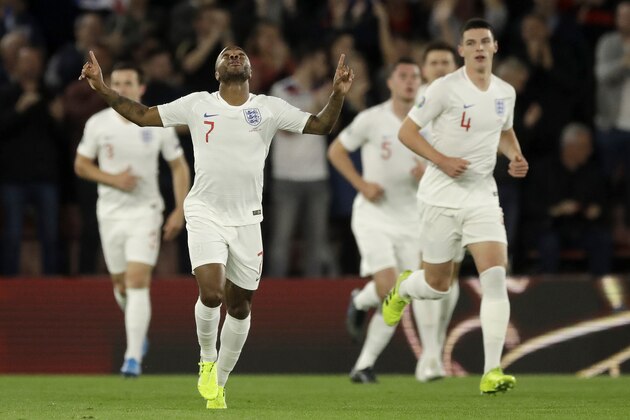 England's Raheem Sterling celebrates scoring his side's first goal during the Euro 2020 group A qualifying soccer match between England and Kosovo at St Mary's Stadium in Southampton, England, Tuesday, Sept. 10, 2019 . (AP Photo/Matt Dunham)