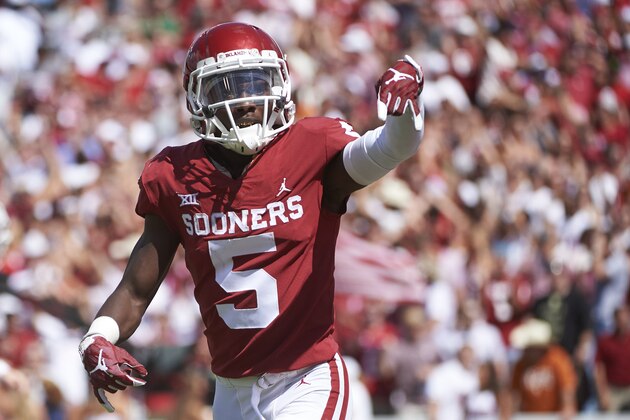 FILE - In this Oct. 6, 2018, file photo, Oklahoma wide receiver Marquise Brown (5) gestures