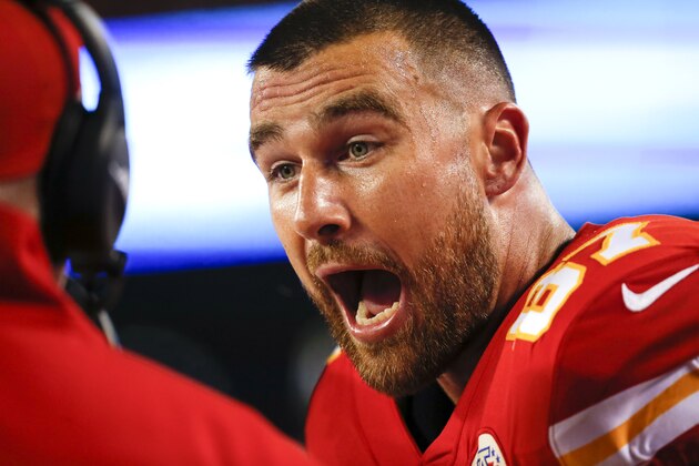 KANSAS CITY, MO - OCTOBER 06: Travis Kelce #87 of the Kansas City Chiefs spoke with head coach Andy Reid of the Kansas City Chiefs on the bench in the third quarter against the Indianapolis Colts at Arrowhead Stadium on October 6, 2019 in Kansas City, Missouri. (Photo by David Eulitt/Getty Images)