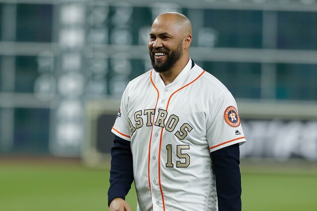 HOUSTON, TX - APRIL 03:  Carlos Beltran throws out the first pitch at Minute Maid Park on April 3, 2018 in Houston, Texas. (Photo by Bob Levey/Getty Images)