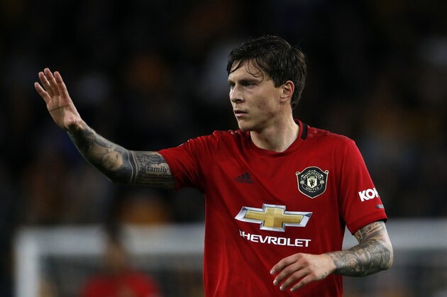 Manchester United's Victor Lindelof waves during the English Premier League soccer match between Wolverhampton Wanderers and Manchester United at the Molineux Stadium in Wolverhampton, England, Monday, Aug. 19, 2019. (AP Photo/Rui Vieira)