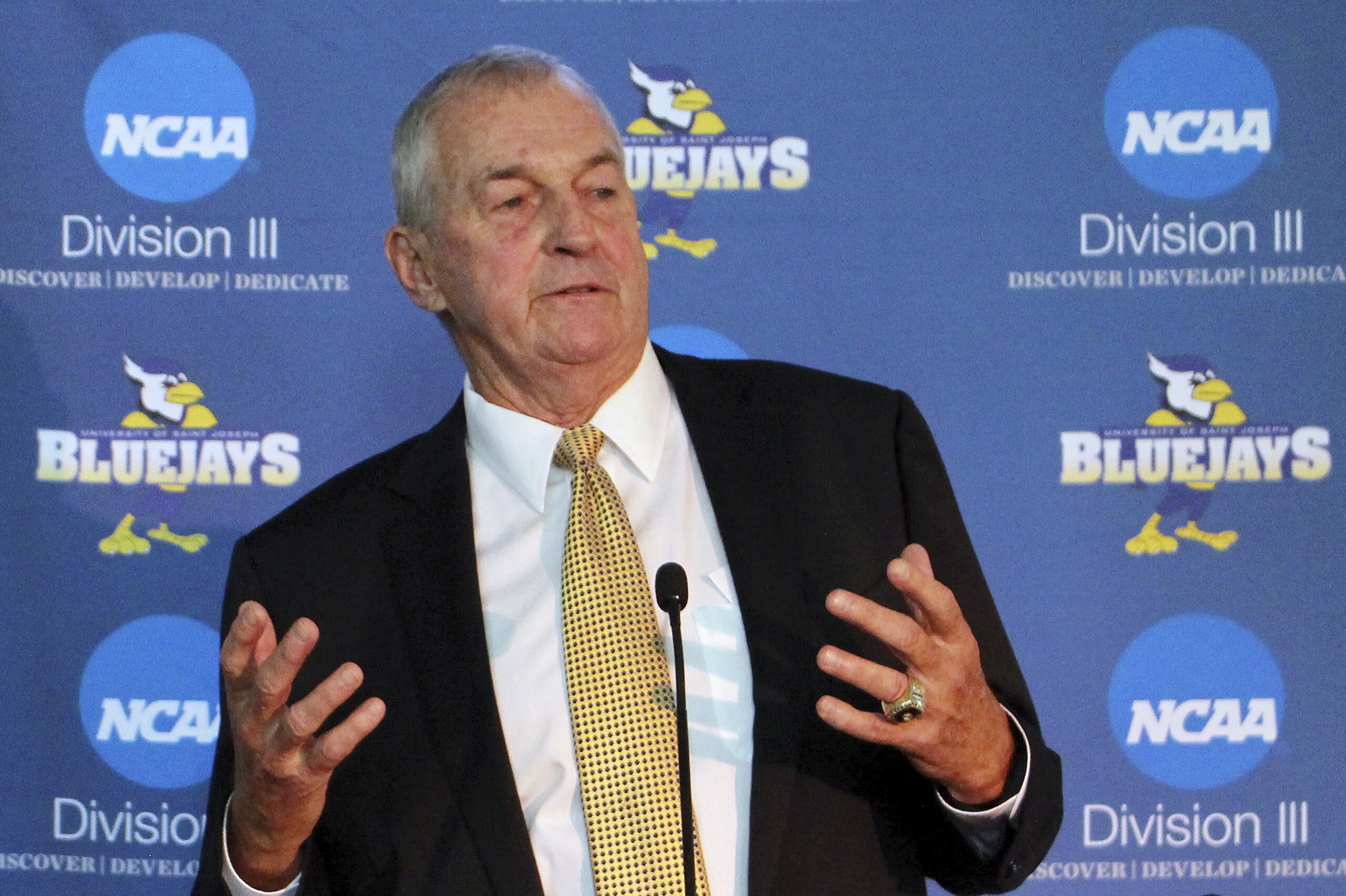 FILE - In this Thursday, Sept. 28, 2017 file photo, Hall of Fame basketball coach Jim Calhoun speaks after he was introduced at the University of Saint Joseph in West Hartford, Conn. Jim Calhoun has officially been named the head coach at Division III Saint Joseph University in Connecticut, Tuesday, Sept. 18, 2018. (AP Photo/Pat Eaton-Robb, File) FILE - In this Thursday, Sept. 28, 2017 file photo, Hall of Fame basketball coach Jim Calhoun speaks after he was introduced at the University of Saint Joseph in West Hartford, Conn. Jim Calhoun has officially been named the head coach at Division III Saint Joseph University in Connecticut, Tuesday, Sept. 18, 2018. (AP Photo/Pat Eaton-Robb, File)
