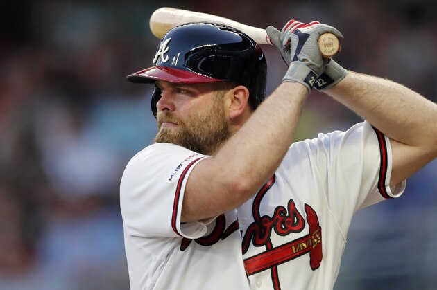 Atlanta Braves catcher Brian McCann (16) bats against the Washington Nationals in the first inning of a baseball game Thursday, Sept. 5, 2019, in Atlanta. (AP Photo/John Bazemore)
