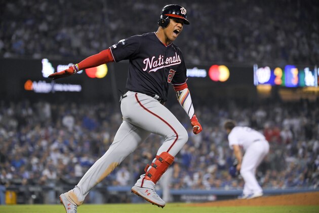 Washington Nationals' Juan Soto celebrates his home run against the Los Angeles Dodgers during the eighth inning in Game 5 of a baseball National League Division Series on Wednesday, Oct. 9, 2019, in Los Angeles. (AP Photo/Mark J. Terrill)