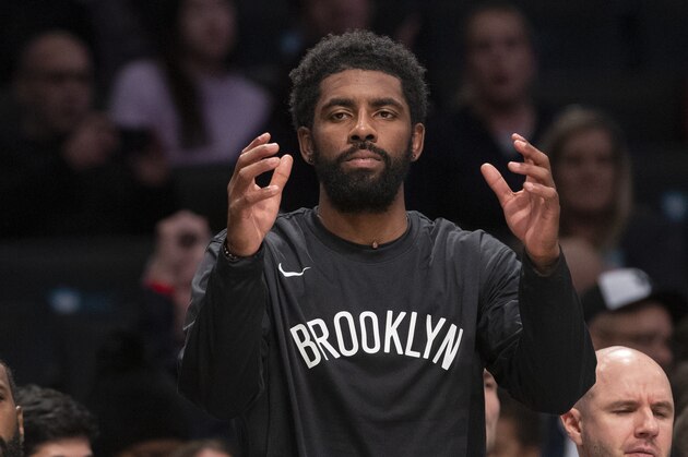 Brooklyn Nets guard Kyrie Irving reacts from the bench during the first half of an exhibition NBA basketball game against the Sesi/Franca Basketball Club, Friday, Oct. 4, 2019, in New York. (AP Photo/Mary Altaffer)
