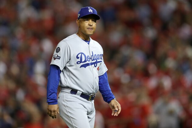 WASHINGTON, DC - OCTOBER 07: Manager Dave Roberts walks to the mound during a pitching change in the fifth inning of game four of the National League Division Series against the Washington Nationals at Nationals Park on October 07, 2019 in Washington, DC. (Photo by Rob Carr/Getty Images)