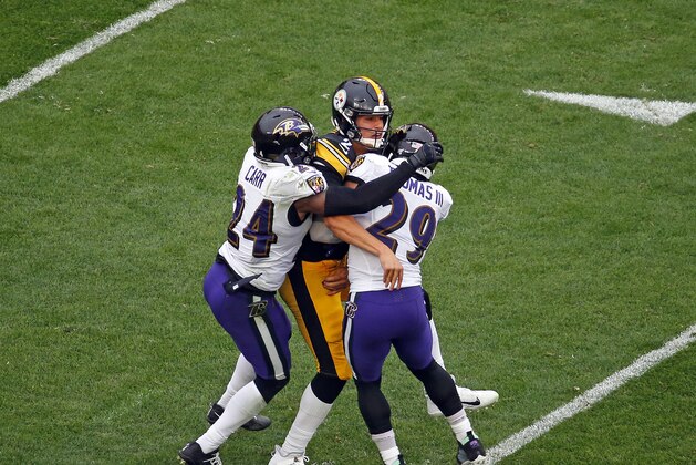 PITTSBURGH, PA - OCTOBER 06:  Mason Rudolph #2 of the Pittsburgh Steelers is injured on the play between Earl Thomas #29 and Brandon Carr #24 of the Baltimore Ravens on October 6, 2019 at Heinz Field in Pittsburgh, Pennsylvania.  (Photo by Justin K. Aller/Getty Images)