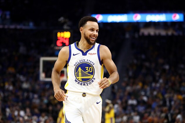 SAN FRANCISCO, CALIFORNIA - OCTOBER 05:  Stephen Curry #30 of the Golden State Warriors smiles during their game against the Los Angeles Lakers at Chase Center on October 05, 2019 in San Francisco, California.  NOTE TO USER: User expressly acknowledges and agrees that, by downloading and or using this photograph, User is consenting to the terms and conditions of the Getty Images License Agreement.  (Photo by Ezra Shaw/Getty Images)