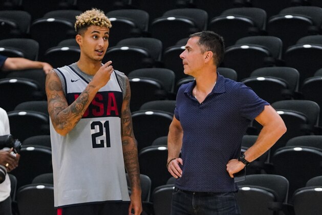 EL SEGUNDO, CALIFORNIA - AUGUST 14: Kyle Kuzma #21 (L) and Lakers GM Rob Pelinka (R) talk together at the 2019 USA Men's National Team World Cup training camp at UCLA Health Training Center on August 14, 2019 in El Segundo, California. (Photo by Cassy Athena/Getty Images)