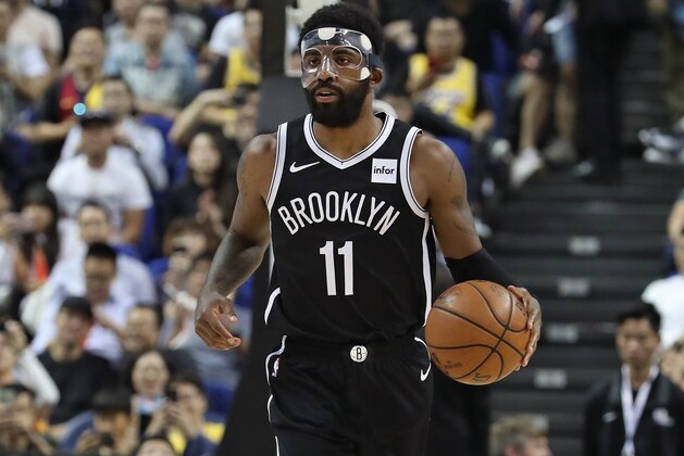 SHANGHAI, CHINA - OCTOBER 10: Kyrie Irving #11 of the Brooklyn Nets dribbles during a preseason game as part of 2019 NBA Global Games China on October 10, 2019 at Mercedes Benz Arena in Shanghai, China. NOTE TO USER: User expressly acknowledges and agrees that, by downloading and/or using this Photograph, user is consenting to the terms and conditions of the Getty Images License Agreement. Mandatory Copyright Notice: Copyright 2019 NBAE (Photo by Nathaniel S. Butler/NBAE via Getty Images)