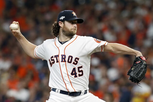HOUSTON, TEXAS - OCTOBER 10:  Gerrit Cole #45 of the Houston Astros delivers the pitch against the Tampa Bay Rays during the second inning in game five of the American League Division Series at Minute Maid Park on October 10, 2019 in Houston, Texas. (Photo by Tim Warner/Getty Images)