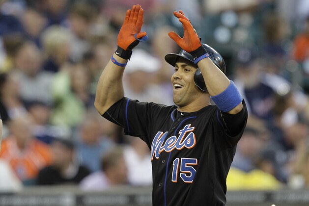 New York Mets' Carlos Beltran celebrates a grand slam against Detroit Tigers pitcher Daniel Schlereth in the fifth inning of a baseball game in Detroit, Tuesday, June 28, 2011  (AP Photo/Paul Sancya)