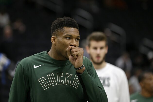 Milwaukee Bucks' Giannis Antetokounmpo warms up before a preseason NBA basketball game against the Utah Jazz Wednesday, Oct. 9, 2019, in Milwaukee. (AP Photo/Aaron Gash)